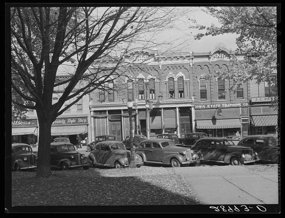 Stores opposite courthouse. Grundy Center, Iowa. Sourced from the Library of Congress.