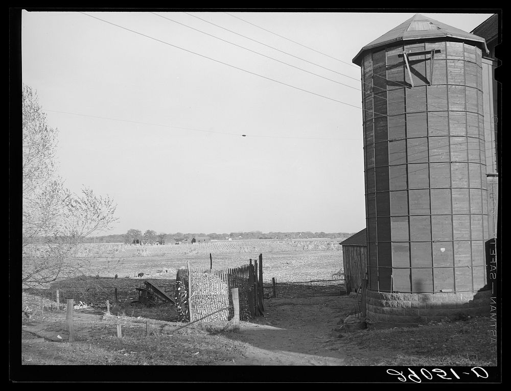 Silo and corn crib. Black Free Photo rawpixel