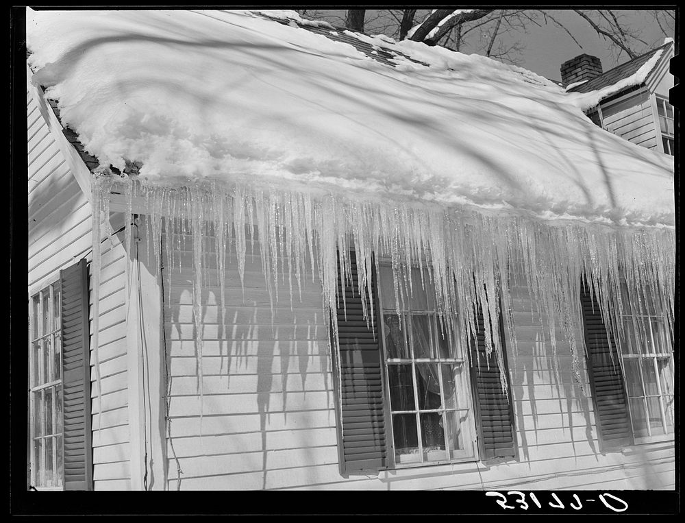Icicles hanging from roof of house in Woodstock, Vermont. Sourced from the Library of Congress.