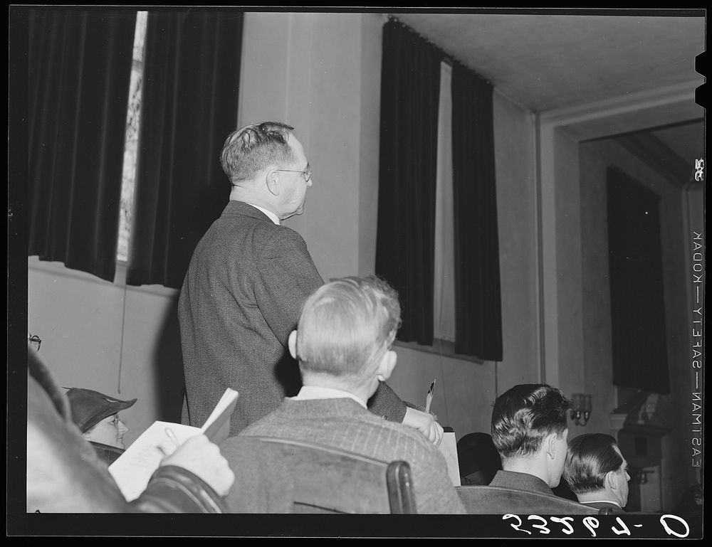 Discussion at town meeting about families who receive charity from the town. Woodstock, Vermont. Sourced from the Library of…
