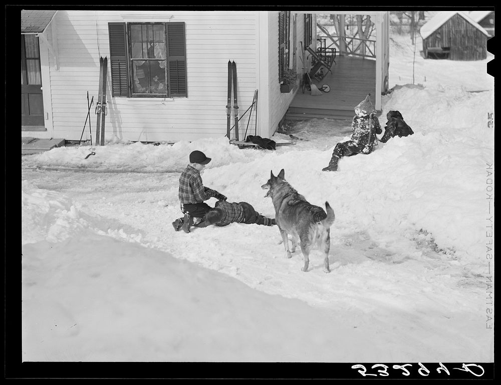 Children playing in front of their home. Woodstock, Vermont. Sourced from the Library of Congress.