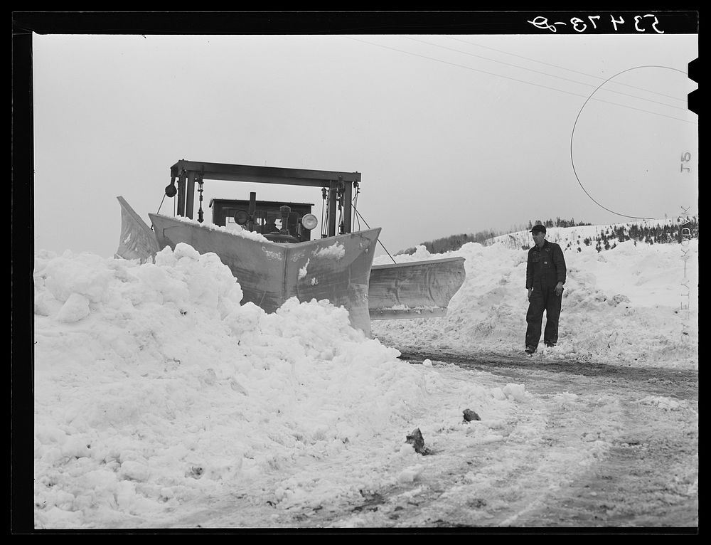 Clearing road with snow plows near Berlin, New Hampshire. Sourced from the Library of Congress.