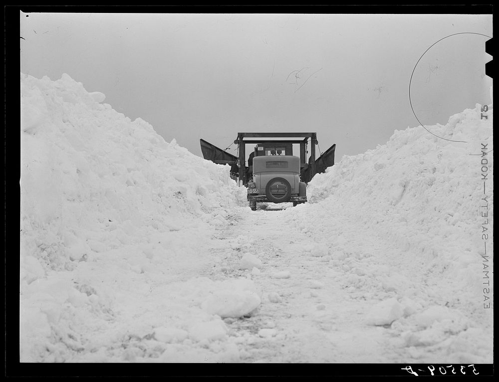 Clearing road with snowplow which got stuck near Berlin, New Hampshire. Sourced from the Library of Congress.