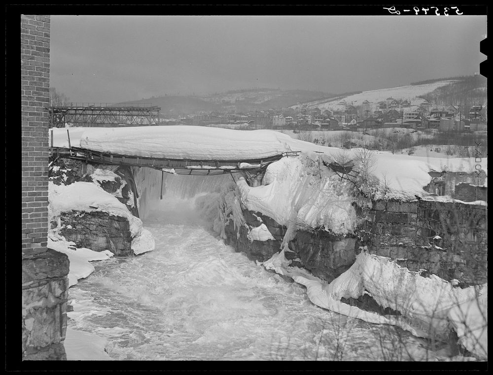 Bridge weighted down by heavy snowfall in Berlin, New Hampshire. Sourced from the Library of Congress.