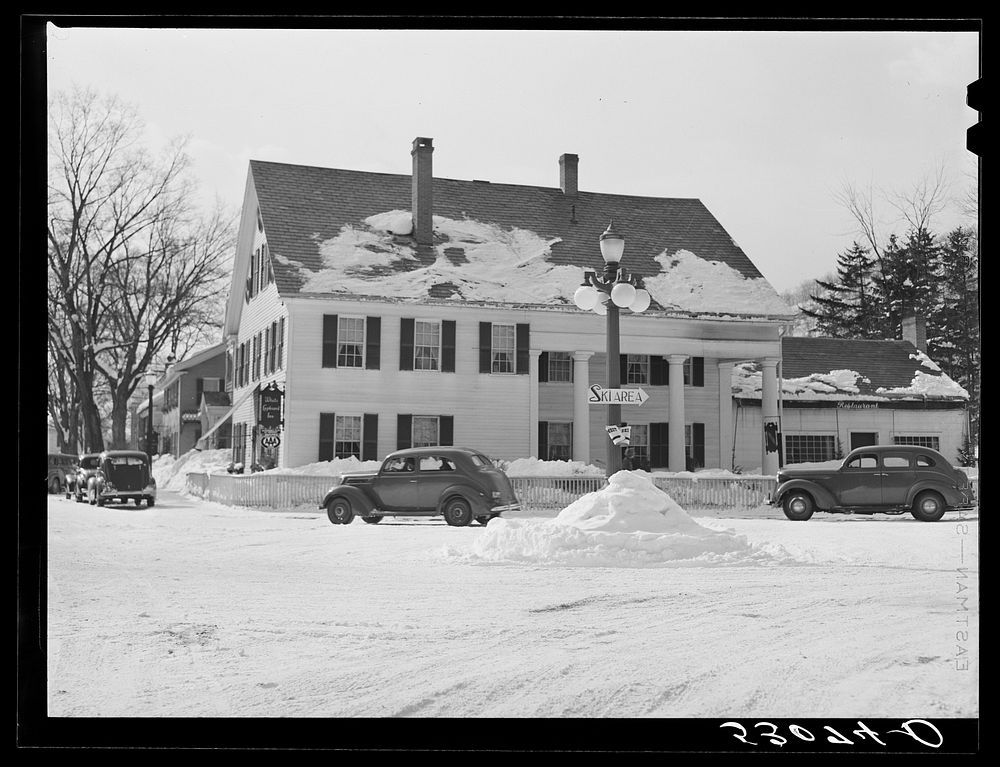 Center of town during skiing season. Woodstock, Vermont. Sourced from the Library of Congress.