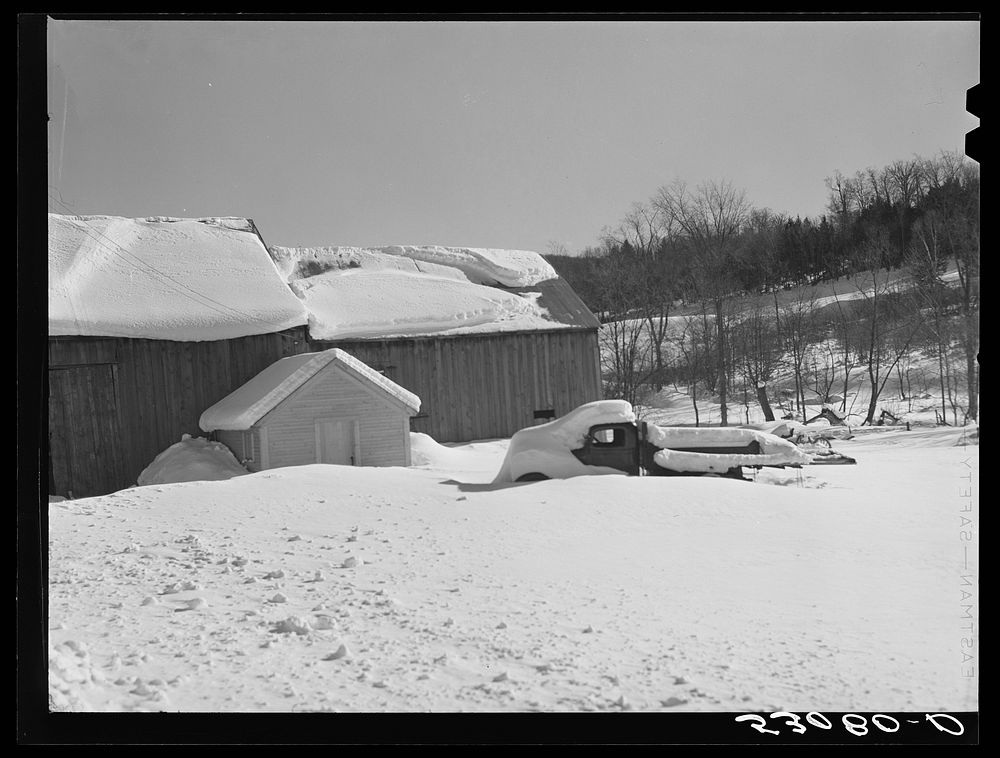 Barn and truck snowed under after storm. Woodstock, Vermont. Sourced from the Library of Congress.