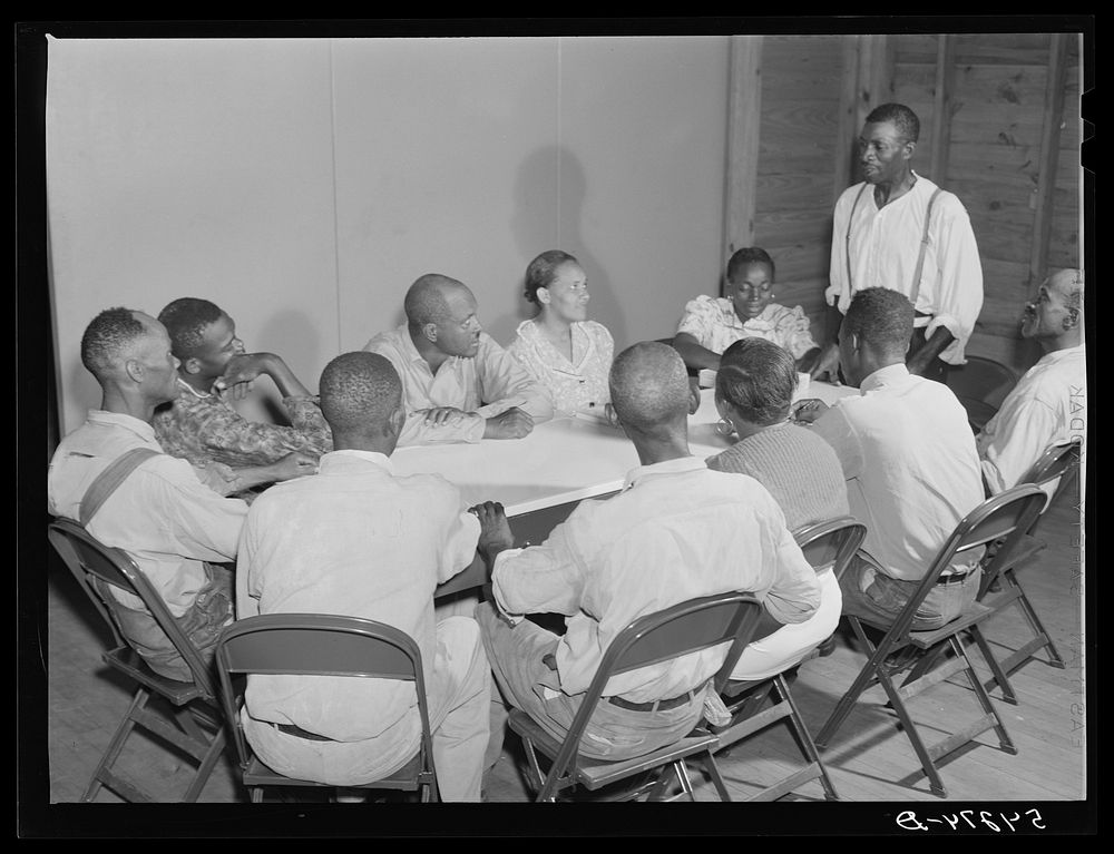 [Untitled photo, possibly related to: The camp council meets to discuss any problems, improvements and plans; sometimes…