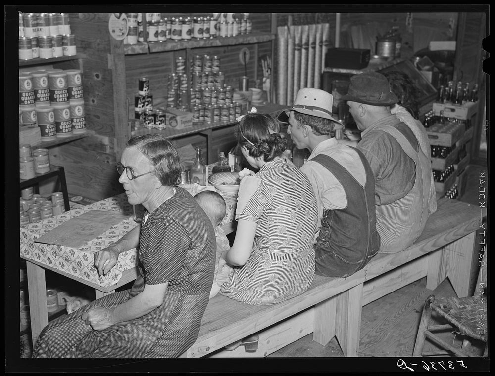 Country people getting a little lunch at crossroad store near Centerville, Arkansas. Faulkner County. Sourced from the…