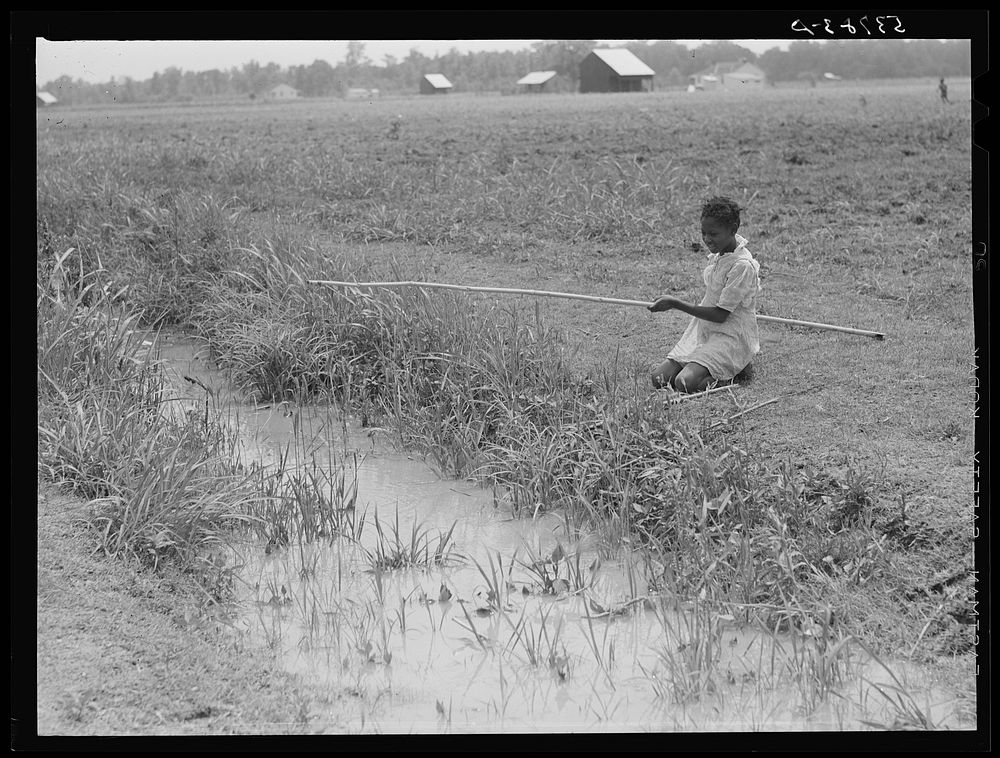  girl fishing in ditch. La Delta Project, Louisiana. Sourced from the Library of Congress.
