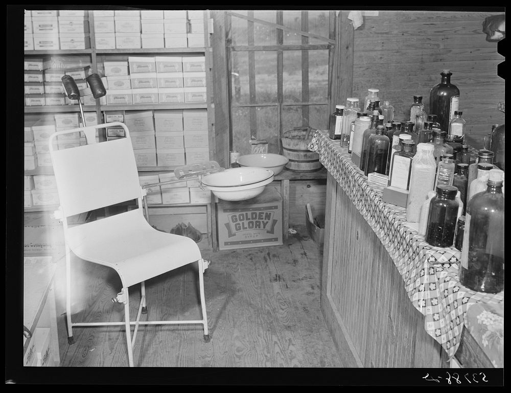 [Untitled photo, possibly related to: Doctor's office in rear of country store. Faulkner County, Arkansas]. Sourced from the…