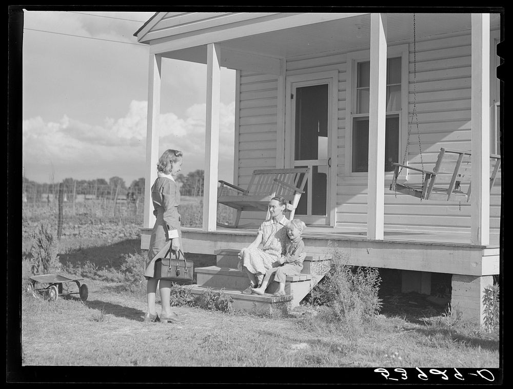 The community nurse, Lucy Akin, makes a home visit to one of the project families. Transylvania Project, Louisiana. Sourced…