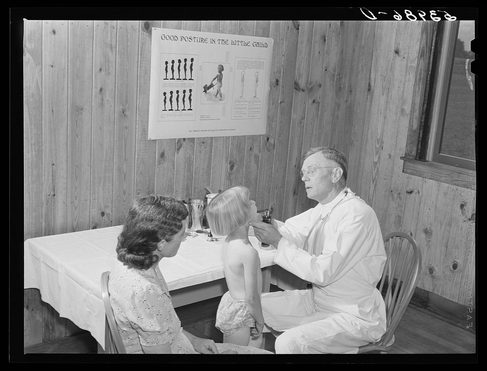 Mrs. M.E. Chappell with her daughter, Sybil Lee, being examined by Dr. F.A. Williams, director of East Carroll Parish health…