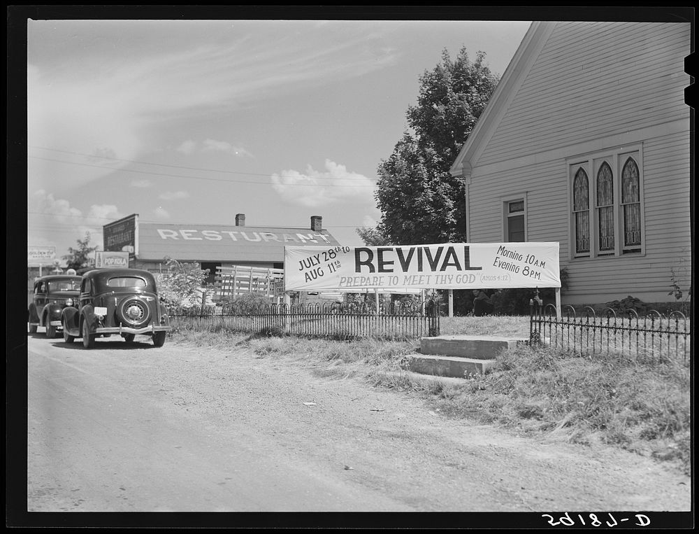 Banner advertising revival meeting in front of church near Lawrenceburg, Kentucky. Sourced from the Library of Congress.