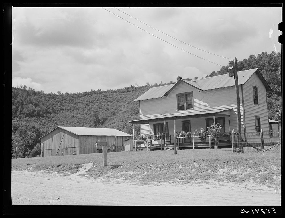 Prosperous farmer's new home and barn near Morehead, Kentucky. Sourced from the Library of Congress.