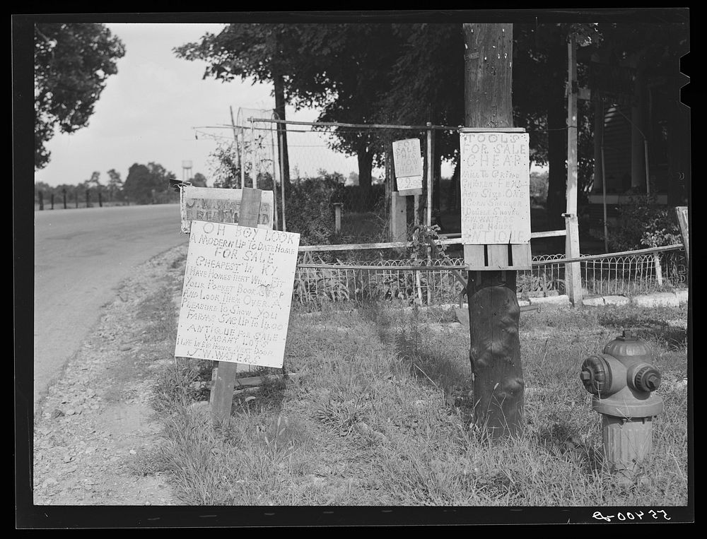 Signs in front of home near Anchorage, Kentucky. Sourced from the Library of Congress.