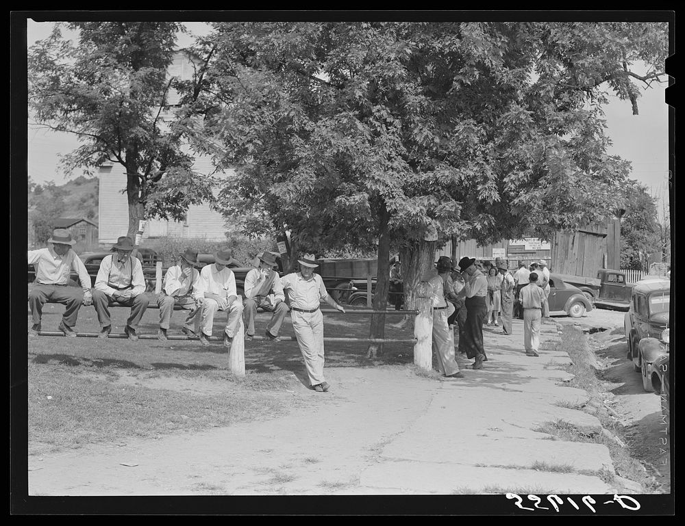 Mountain people and farmers exchanging news and greetings near the courthouse on court day. Campton, Wolfe County, Kentucky.…