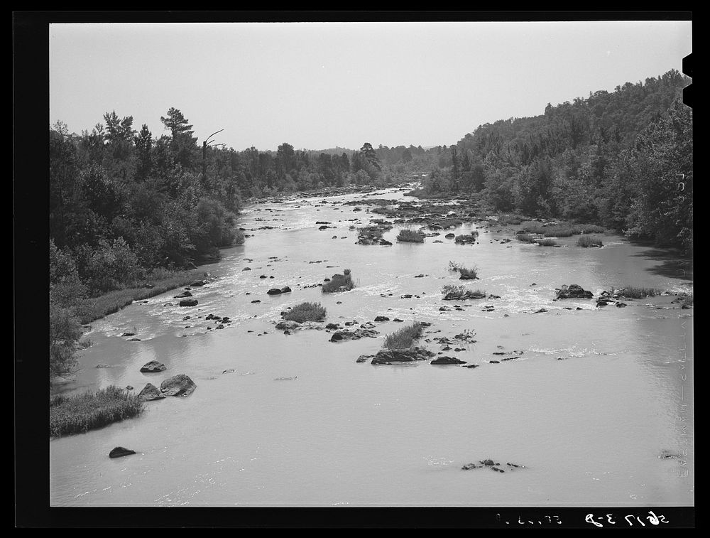 Haw River from bridge on Highway 64 east of Pittsboro. Chatham County, North Carolina. Sourced from the Library of Congress.