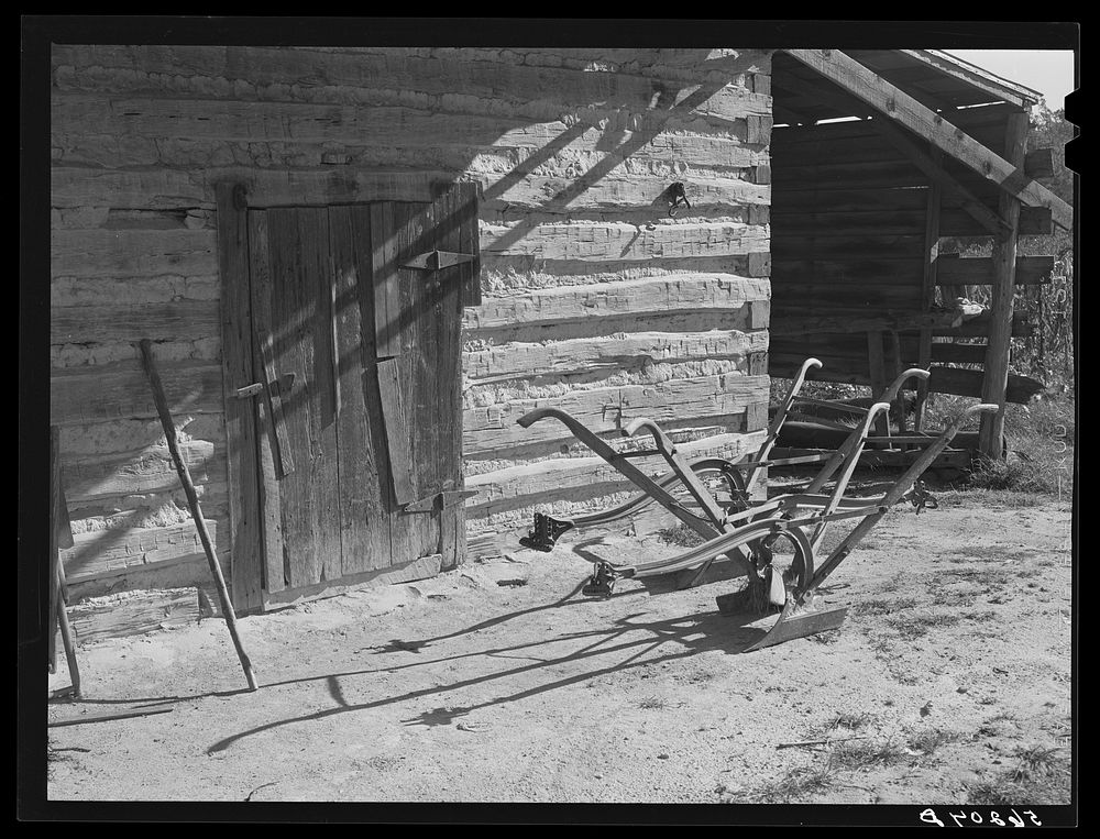 [Untitled photo, possibly related to: Tobacco barn, now used for storing supplies, on Emery Hooper's farm in Corbett Ridge…
