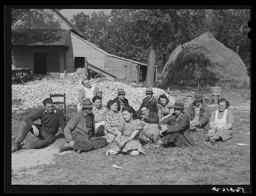 Resting after dinner following a corn shucking on Hoopers' farm in Corbett Ridge section. Caswell County, North Carolina.…