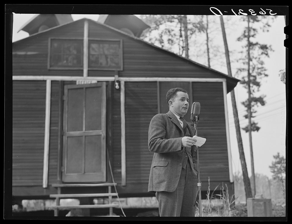 Prominent farmer and member of the land use planning committee speaking at a picnic and barbecue at the CCC (Civilian…