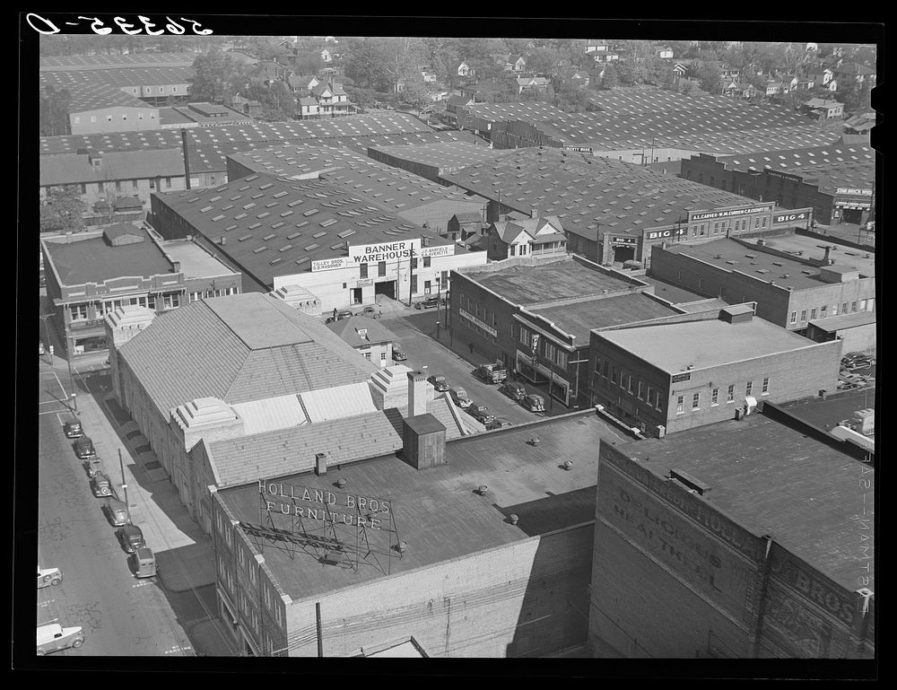 [Untitled photo, possibly related to: Tobacco warehouse section of Durham, North Carolina]. Sourced from the Library of…