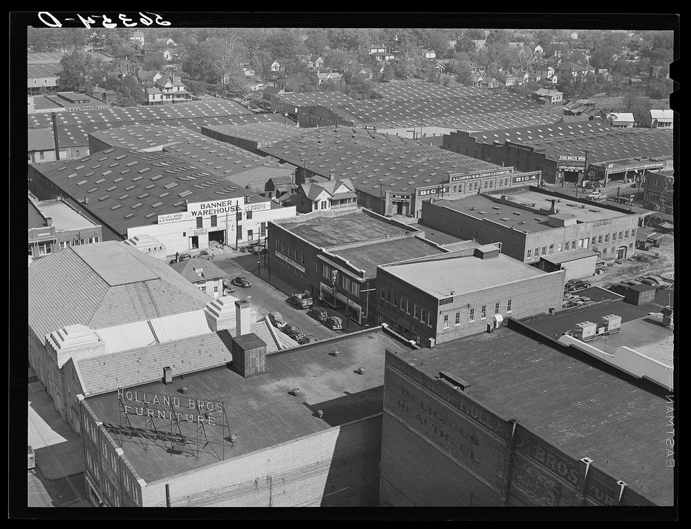 [Untitled photo, possibly related to: Tobacco warehouse section of Durham, North Carolina]. Sourced from the Library of…