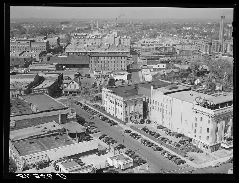 [Untitled photo, possibly related to: Center of city, with Chesterfield cigarette factory in background. Durham, North…