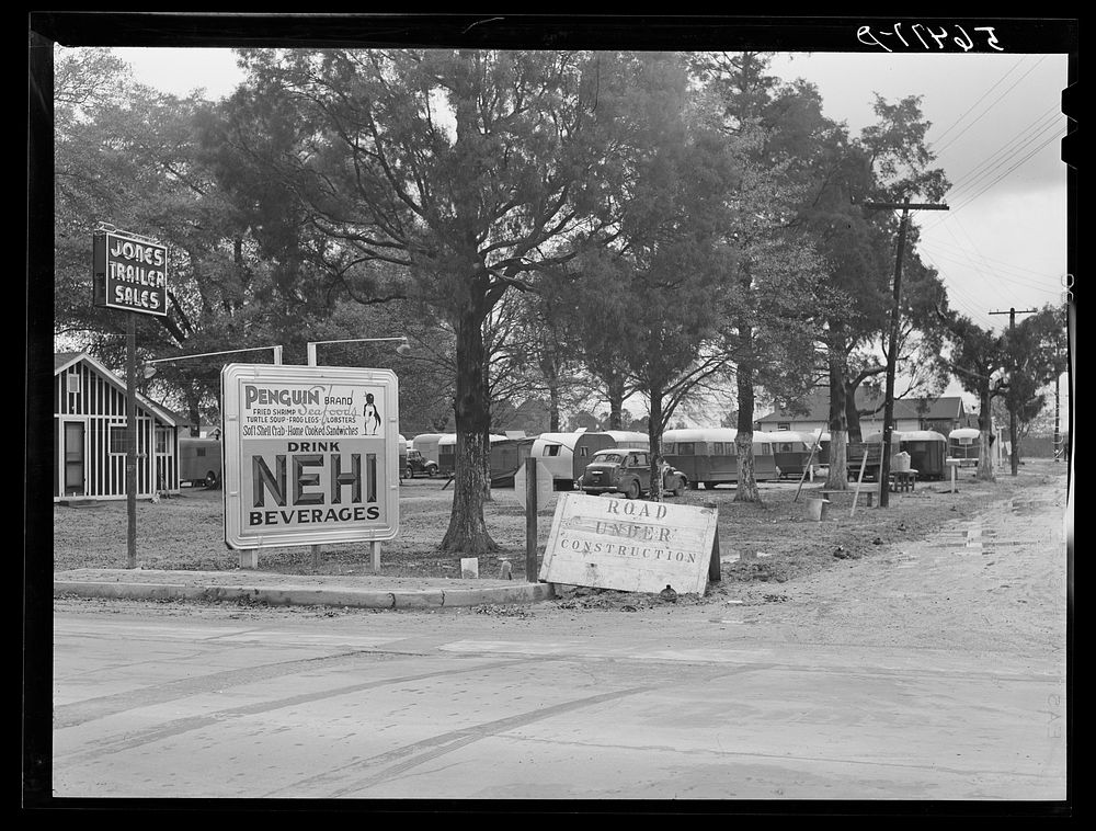 Jones Trailer Sales and Restaurant; also road construction signs in front of trailer camp on highway near Fort Benning…