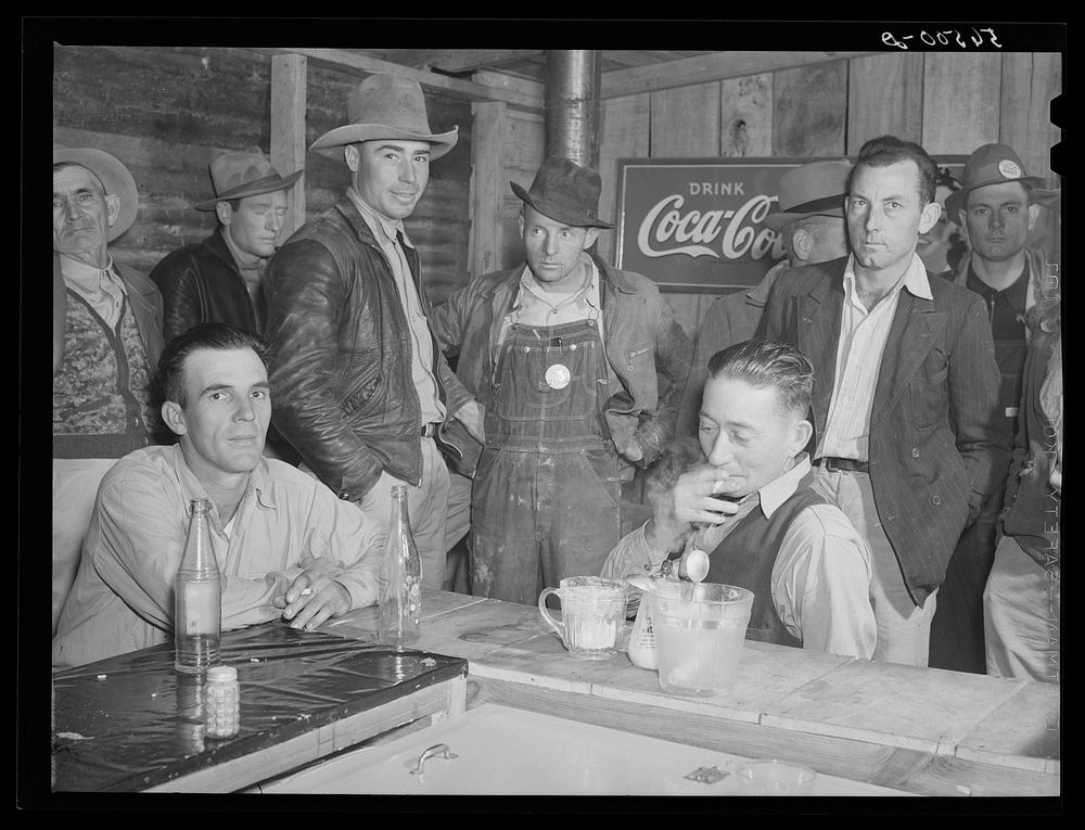 Construction workers from Camp Livingston eating and hanging around new cafe by entrance of camp. Alexandria, Louisiana.…