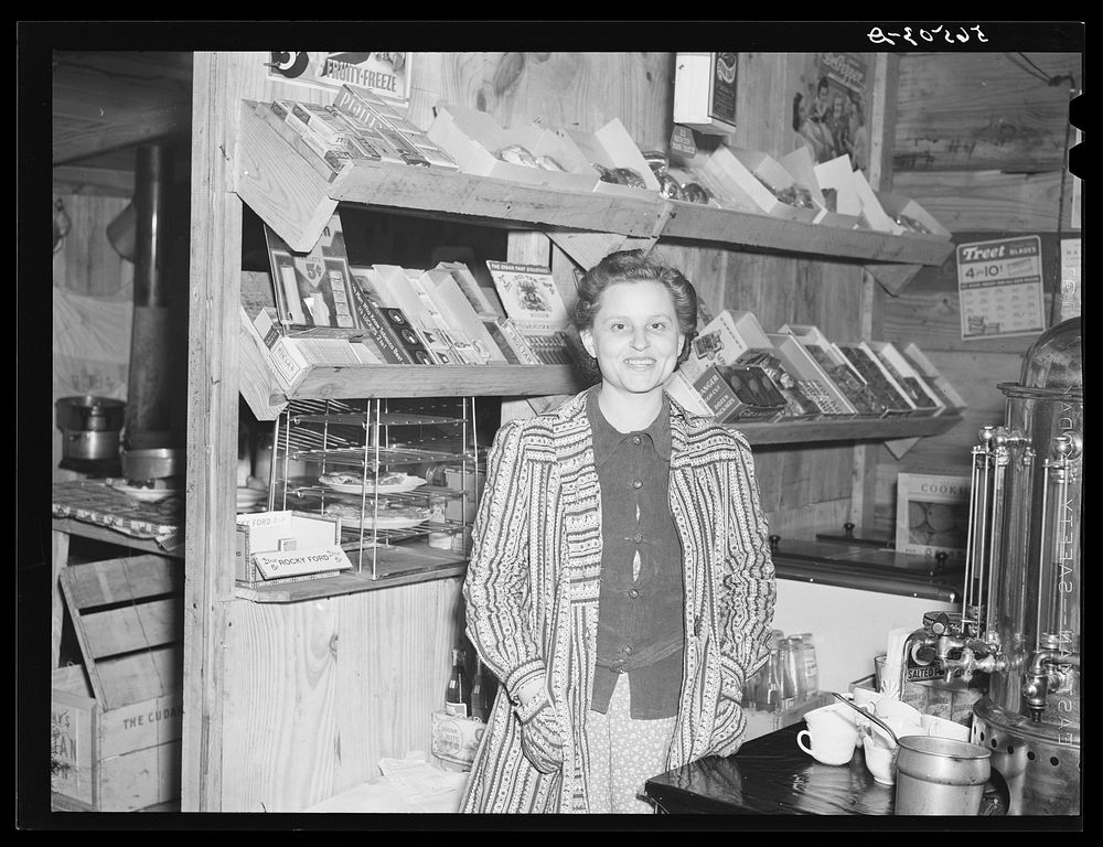 [Untitled photo, possibly related to:  girl in new cafe opposite entrance to Camp Livingston. Alexandria, Louisiana].…