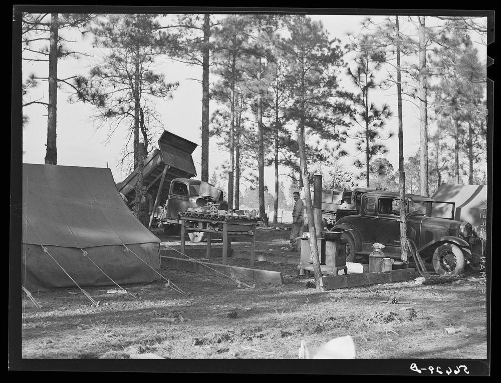 Gravel pit camp near Camp Beauregard, Alexandria, Louisiana. Construction workers living on government property. Sourced…
