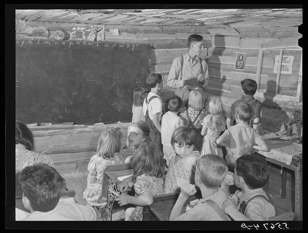 Overcrowded conditions and poor equipment in rural mountain school. In Breathitt County, Kentucky. Sourced from the Library…
