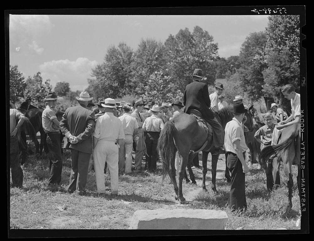 Farmers trading mules and horses on "Jockey Street" in Campton, Kentucky. Sourced from the Library of Congress.