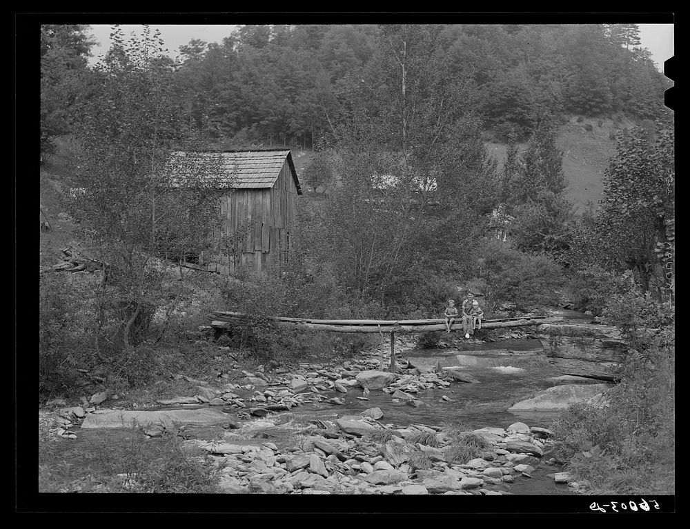 [Untitled photo, possibly related to: Farmhouses along creek bed in recently flooded area northwest of Asheville, North…