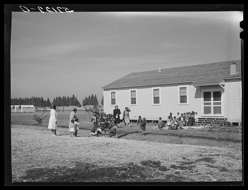 [Untitled photo, possibly related to: Children of migratory laborers outside of day nursery at Okeechobee migratory labor…
