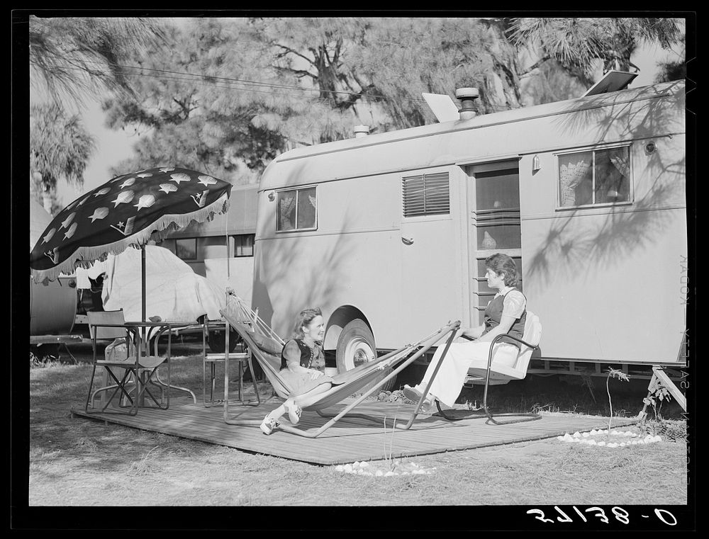 Guests of Sarasota trailer park outside their trailer home. Sarasota, Florida. Sourced from the Library of Congress.