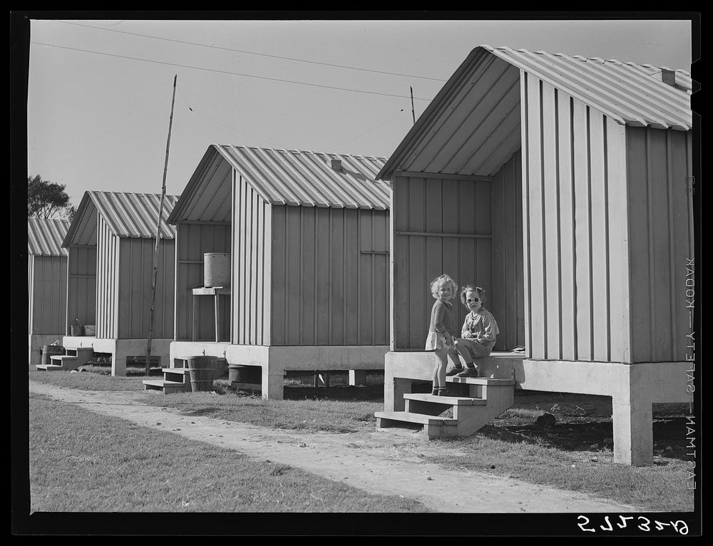 Metal shelters for agricultural and packing house workers. Osceola migratory labor camps, Belle Glade, Florida. Sourced from…