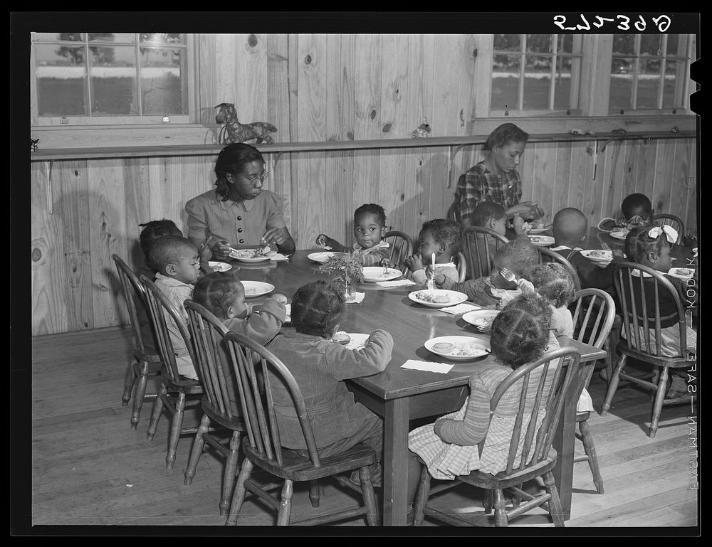 Hot lunches for children of agricultural workers in day nursery of Okeechobee migratory labor camp. Belle Glade, Florida.…