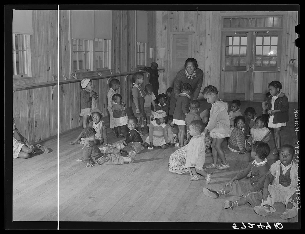 Children of agricultural workers in the day nursery waiting for their mothers to take them home in the evening. Okeechobee…