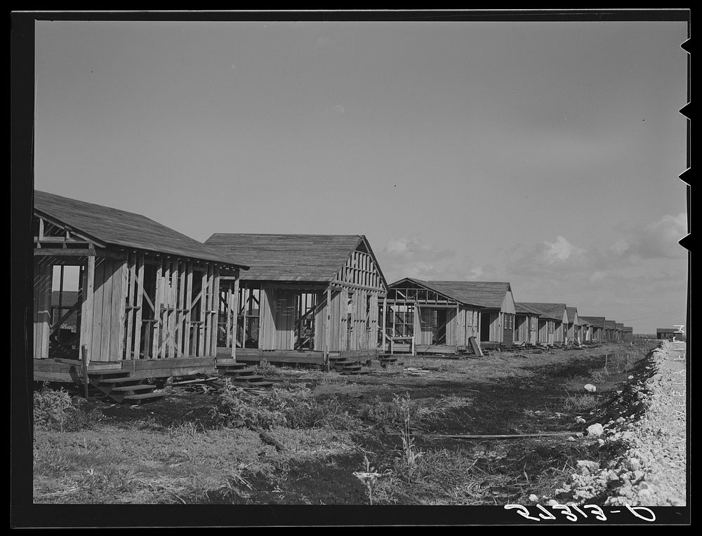 Buildings being erected for migratory labor in Pahokee, Florida. Sourced from the Library of Congress.