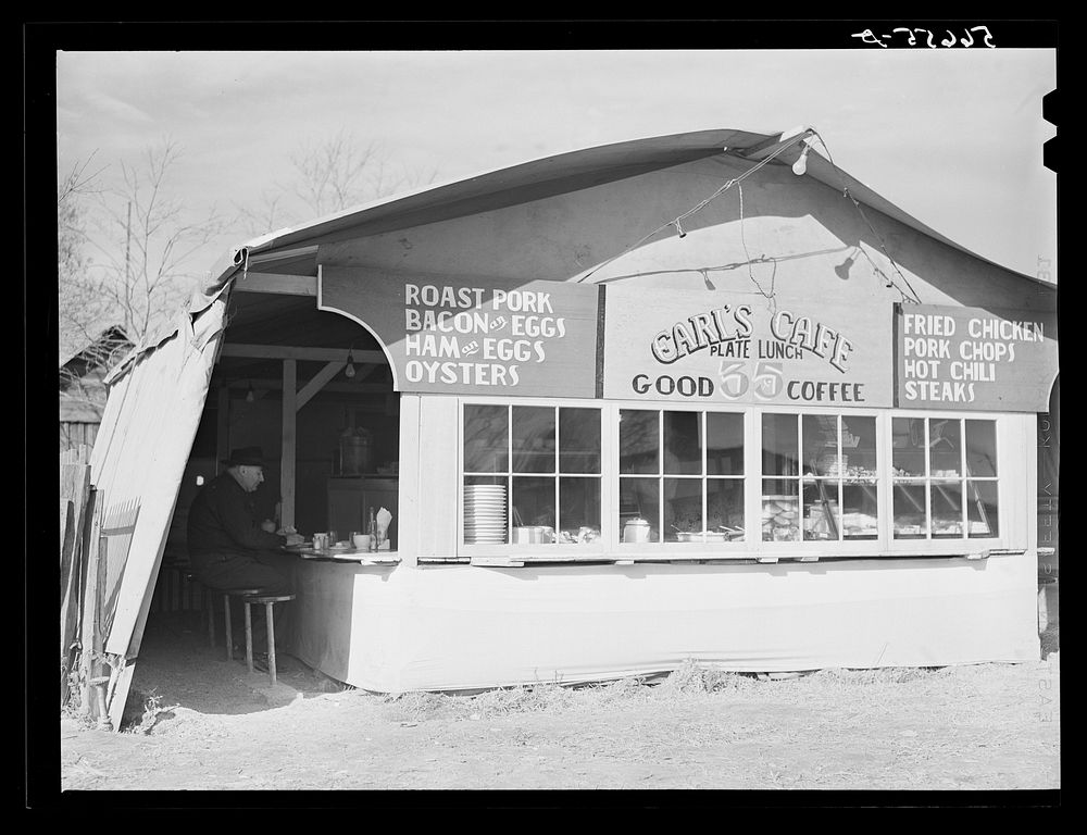 Carl's Cafe (lunchroom tent) put up about three months ago. Plate lunch increased from twenty-five cents to thirty-five…