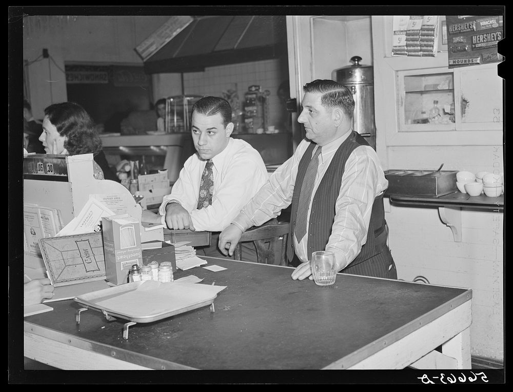 Manager and cashier at cafe in Alexandria, Louisana, where construction workers eat. Sourced from the Library of Congress.