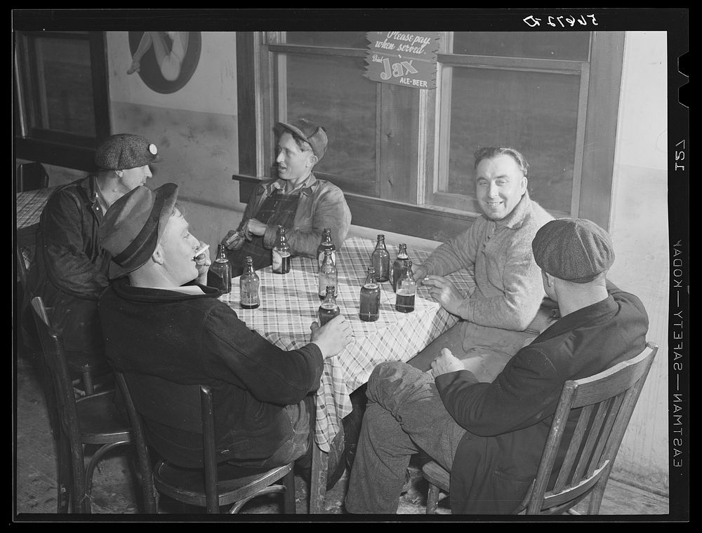 Finnish construction workers from New York, drinking beer and spending their leisure time in a new cafe near Camp Blanding.…