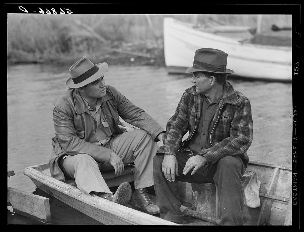[Untitled photo, possibly related to: FSA (Farm Security Administration) supervisor talking to one of the trappers in his…