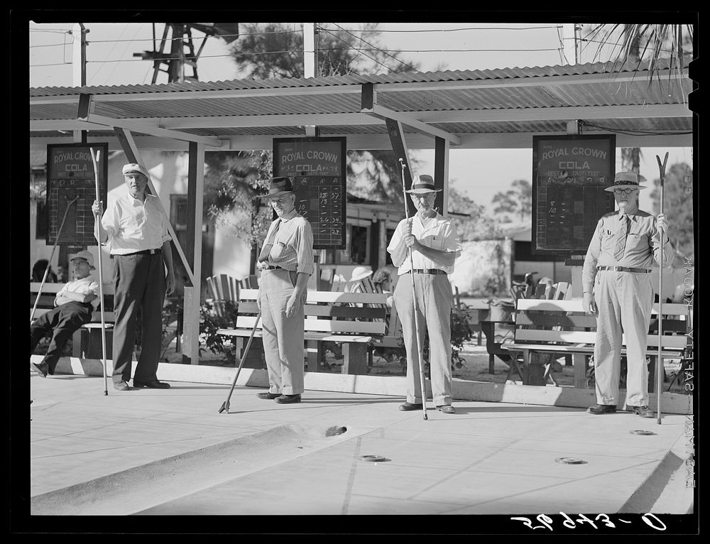 [Untitled photo, possibly related to: Playing shuffleboard. Sarasota trailer park, Sarasota, Florida]. Sourced from the…