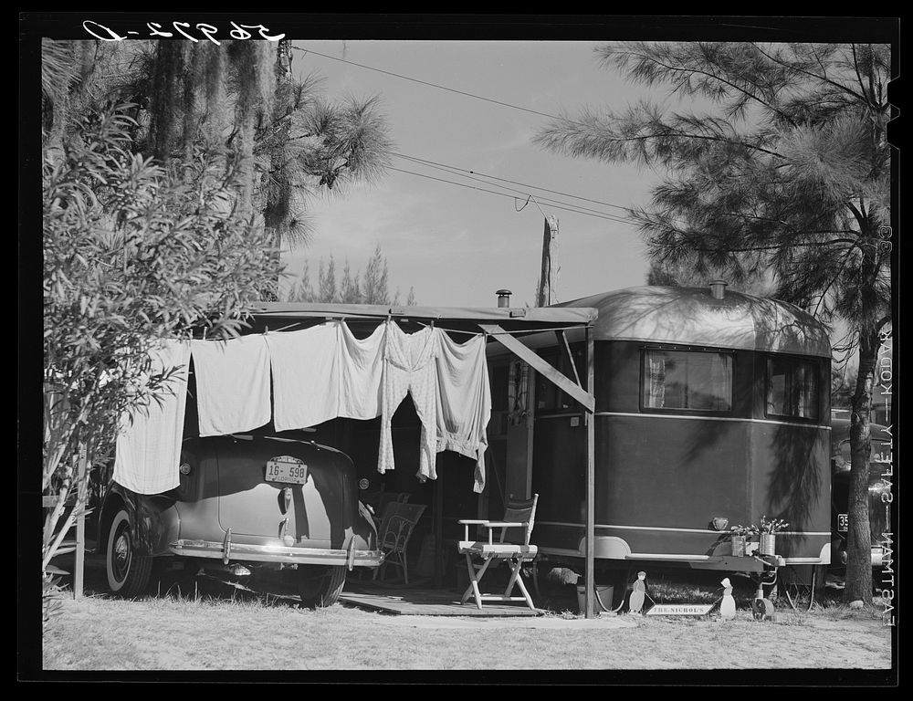 Family wash outside of trailer home. Sarasota trailer park, Sarasota, Florida. Sourced from the Library of Congress.