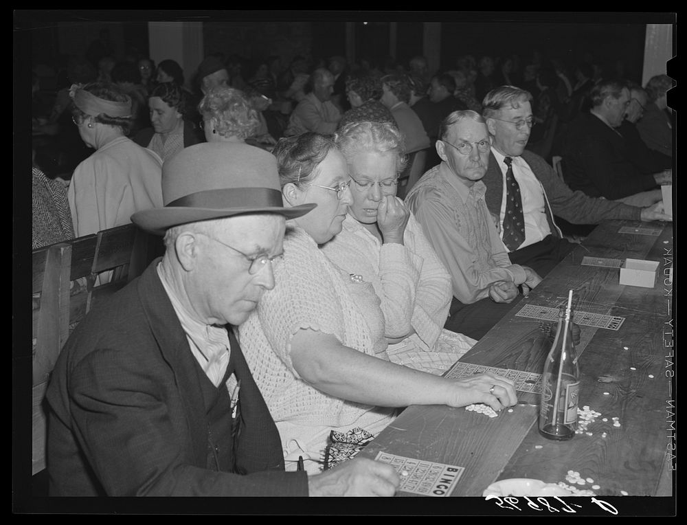 Guests of Sarasota trailer park, Sarasota, Florida, enjoying a few games of "bingo". Sourced from the Library of Congress.