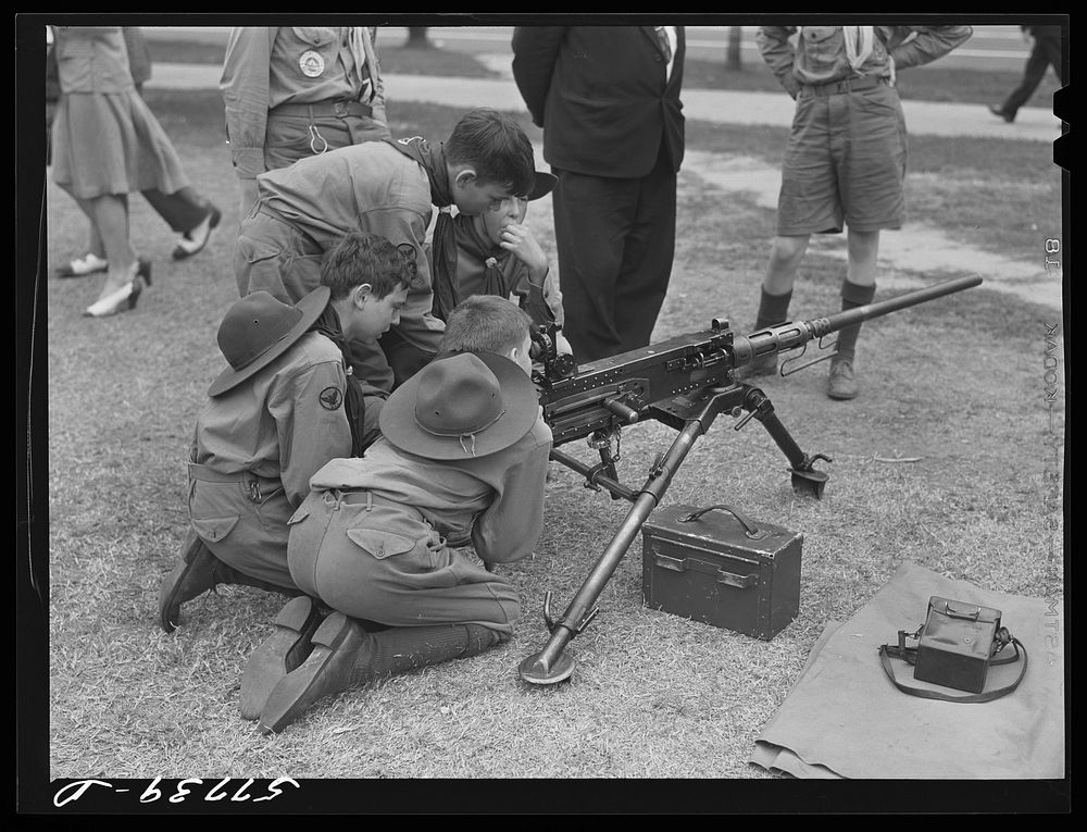 Boy scouts inspecting and learning about Army equipment in Commerce Square, Washington, D.C.. Sourced from the Library of…