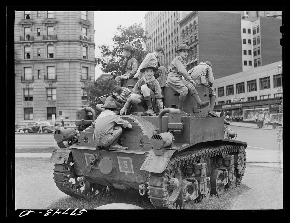 Boy scouts inspecting and learning about Army equipment in Commerce Square, Washington, D.C.. Sourced from the Library of…