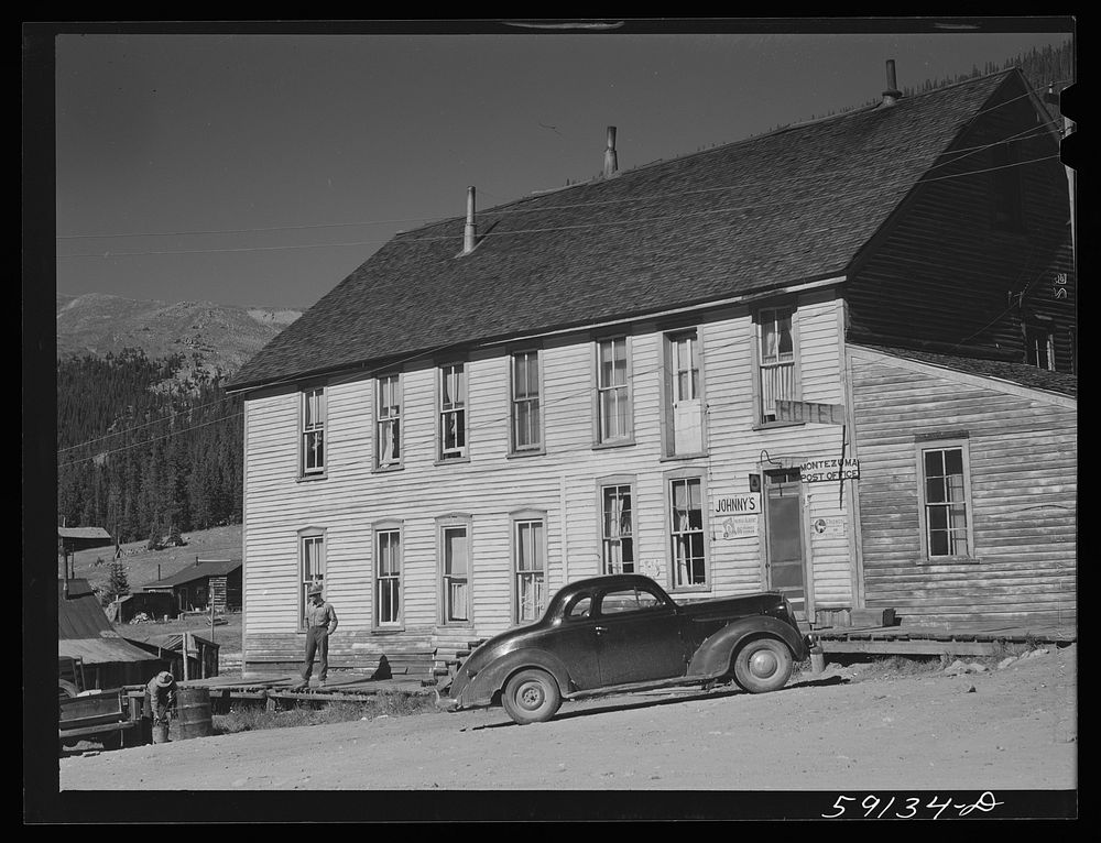 Hotel and post office in ghost town now coming to life because of defense minining boom. Montezuma, Colorado. Sourced from…